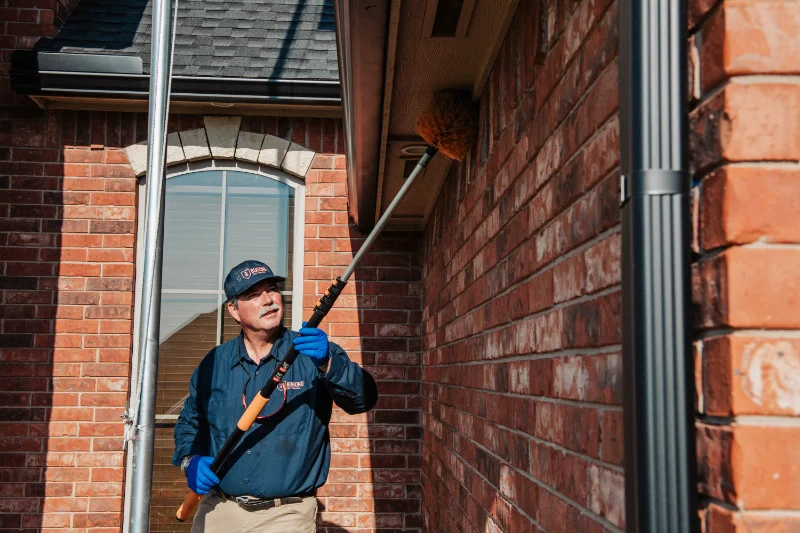 Rob sweeping outdoors for Bugono Pest Control Rob sweeping outdoors for Bugono Pest Control